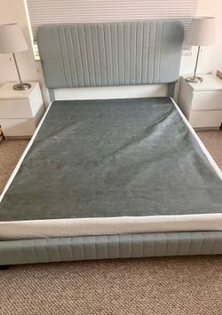 Spring box fits in a queen bed frame