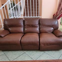leather sofa with three seats  ..recliner . Seats are opens