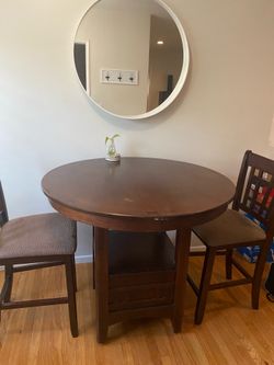 Brown dinning table that can extend