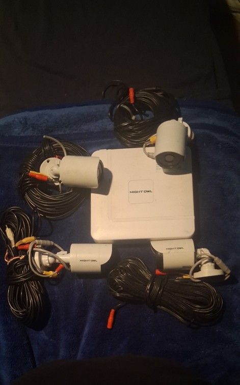 4 Night Owl Surveillance Cameras With DVR