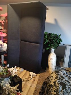 L Shaped dark blue couch