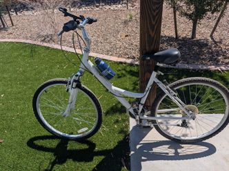 NISHIKI  comfort hybrid bike designed specifically for women, suspension seat,21 speed,17" Frame,26" Tires, Like New, low step Telephone Holder
