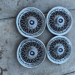 vintage Buick 14-inch wire spoke Hubcaps