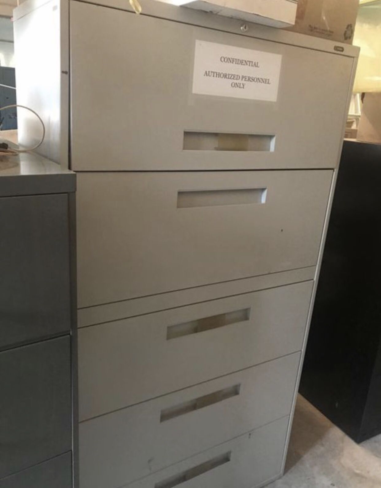 Solid file cabinet. Deep drawers good for HR use commercial grade