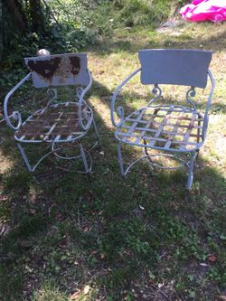 Pair unique wrought iron chairs