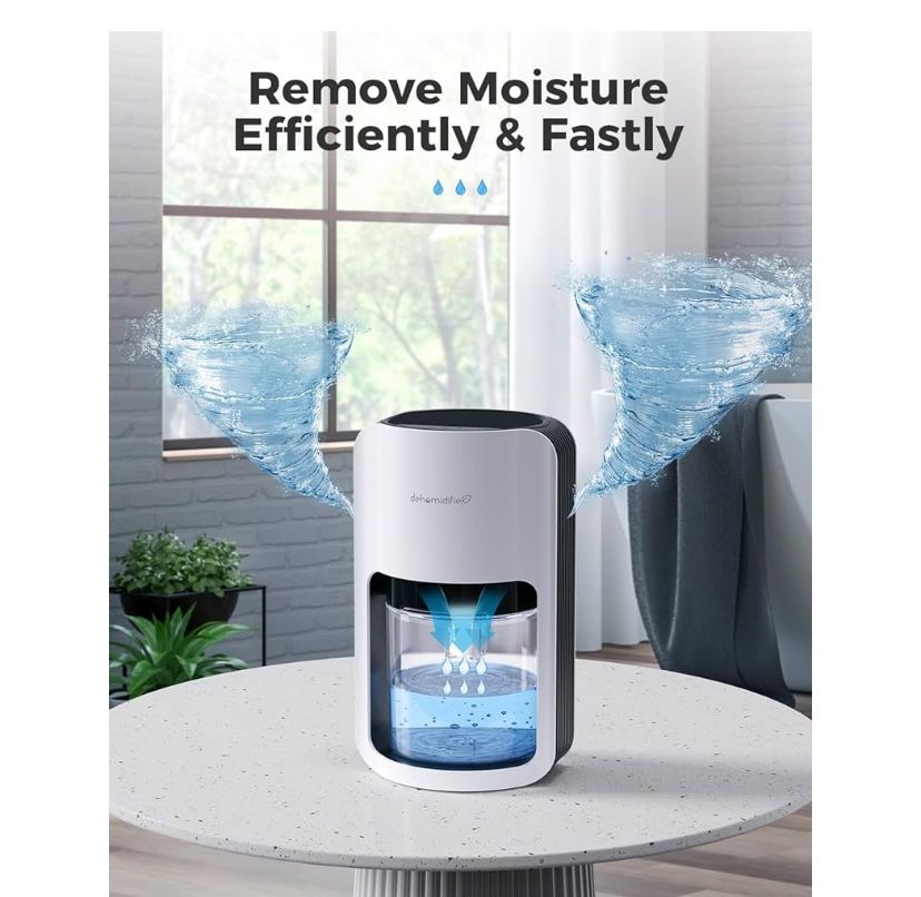 Dehumidifier for Home, Bathroom, Cloakroom with Timer, Mode And Blue Light Buttons. And Handle Portable. Barley Used It Is Like New.