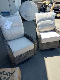 2 Patio chairs that spin