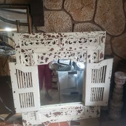 Unique mirror with old world look.        Price reduced!