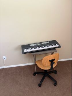 Yamaha ez 200 keyboard with chair