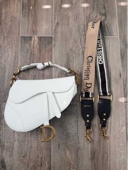 White Diors Saddle leather purse