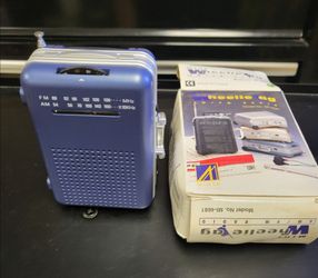 WHEELIE BAG

AM-FM RADIO