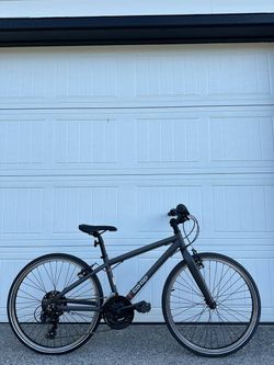 REI Co-op REV CTY 24 — 21-Speed Youth Bike