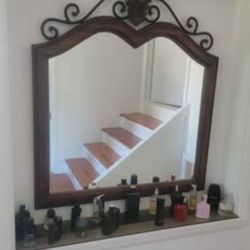 Beautiful wood and wrought iron Drexel mirror. 39 x 42H