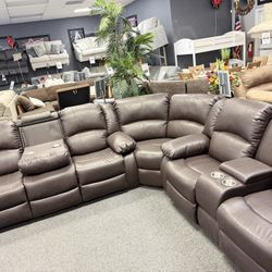 Recliner Sectional With Drop Down Console Available In Black