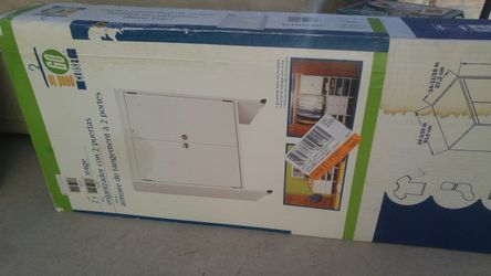 Furniture you assemble. In box. Cabinet with shelf.