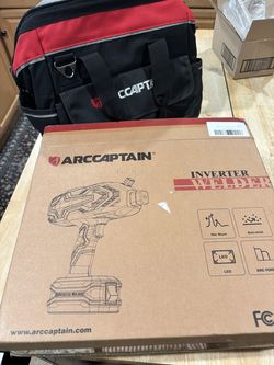 Portable stick welder with bag.