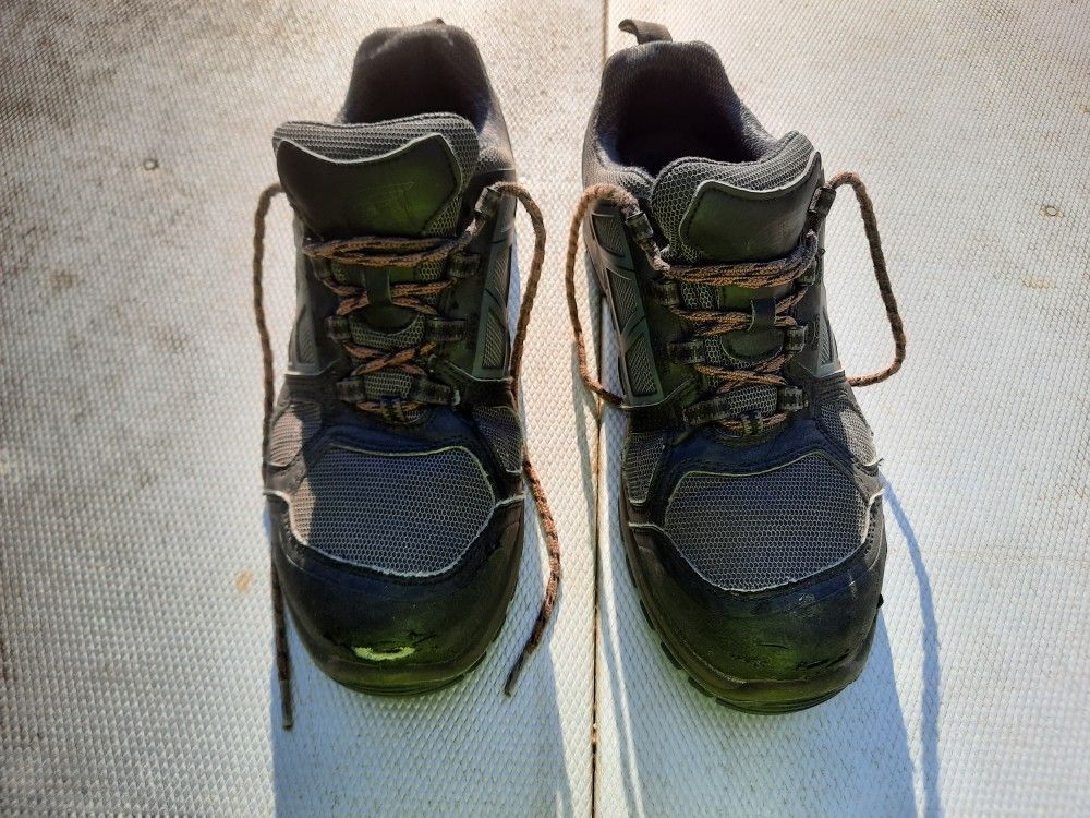 Red wing work boots with steel toe.