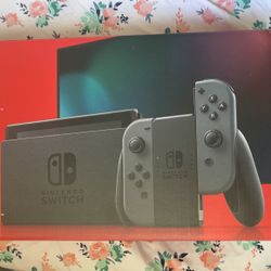 Nintendo Switch with Gray Joy-Con