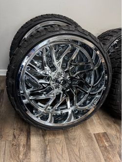 NEW 26x12 TIS chrome wheels wrapped in RBP RT tires. 305/30r26 same as a 33