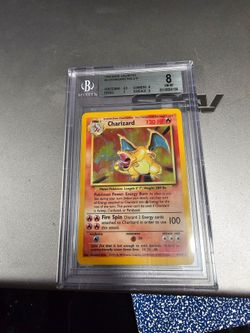 Charizard base set beckett 8