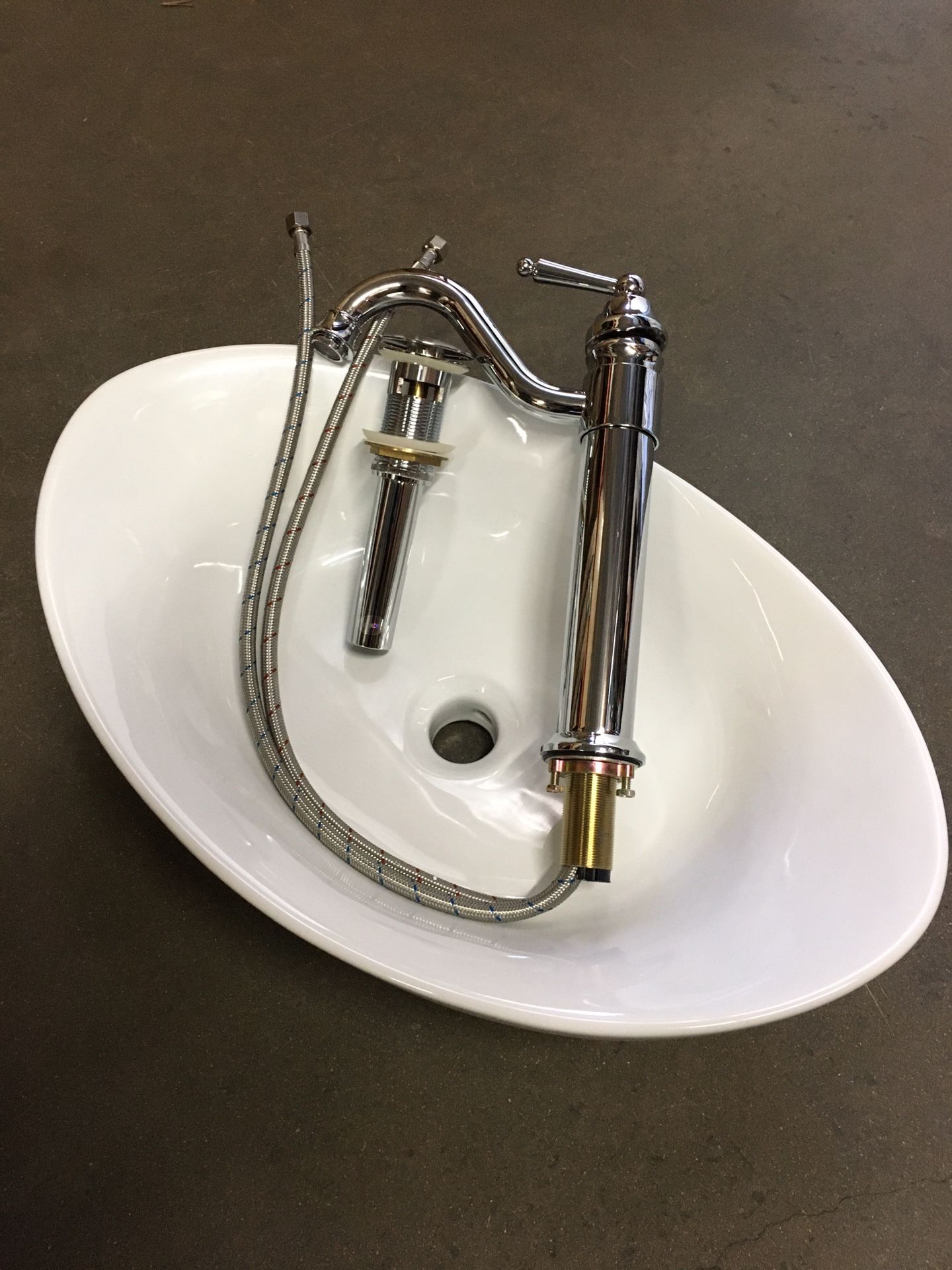 New in Box $60 chrome color single handle bathroom faucet egg shape vessel sink with pop up drain