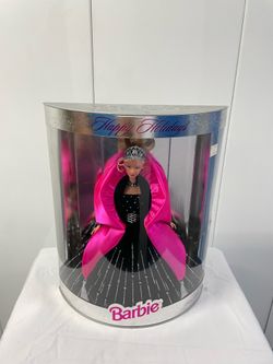 7 Collectable Barbies $120