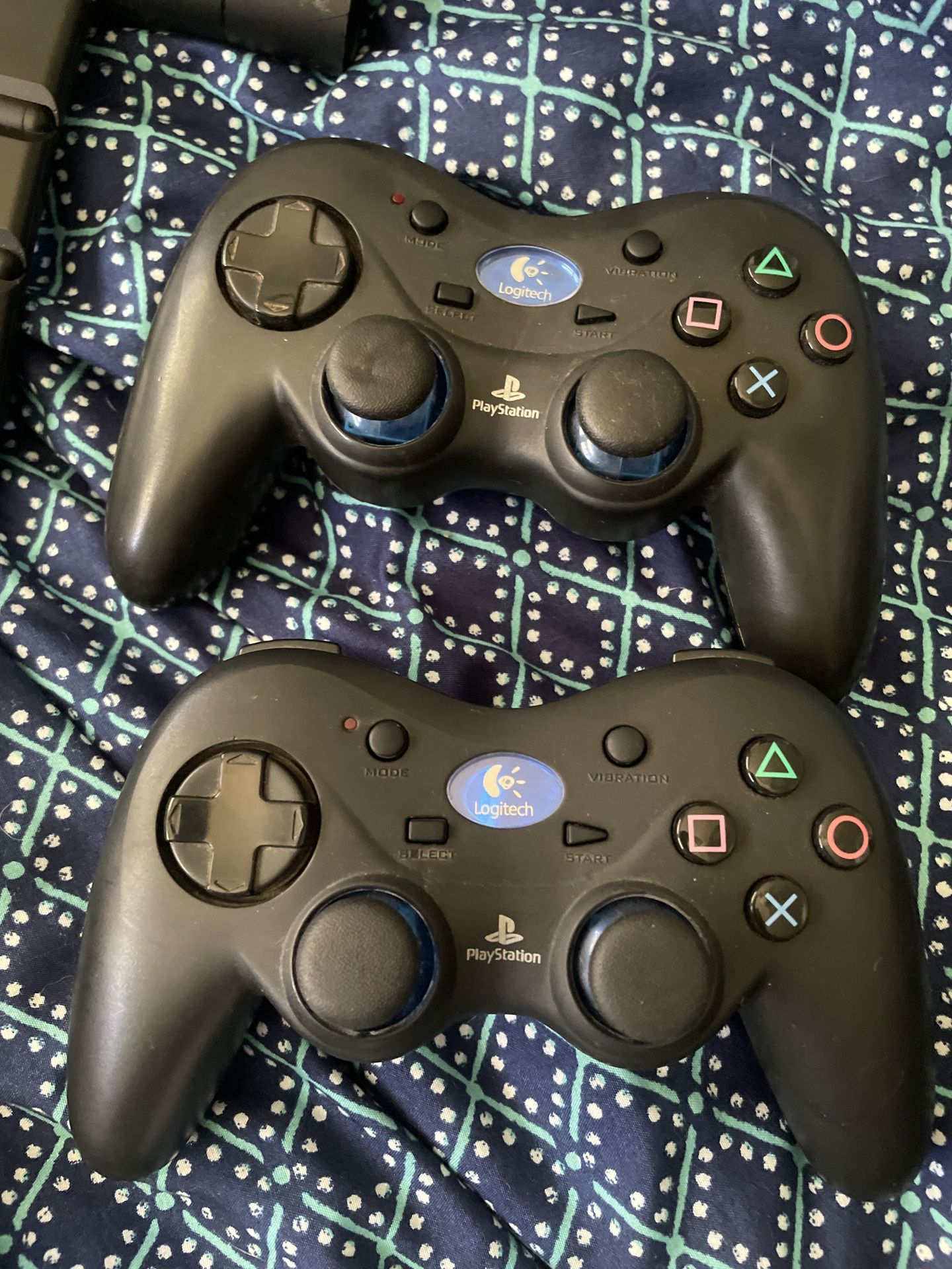 Two Logitech controllers for PlayStation and two cameras