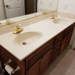 Cultured marble vanity top w/ double sink. Available Now