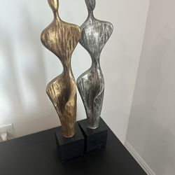 Gold And Silver Statues