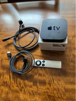 Apple TV unit with cables and remote