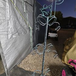 Man sleeping buy cactus medal wine rack.