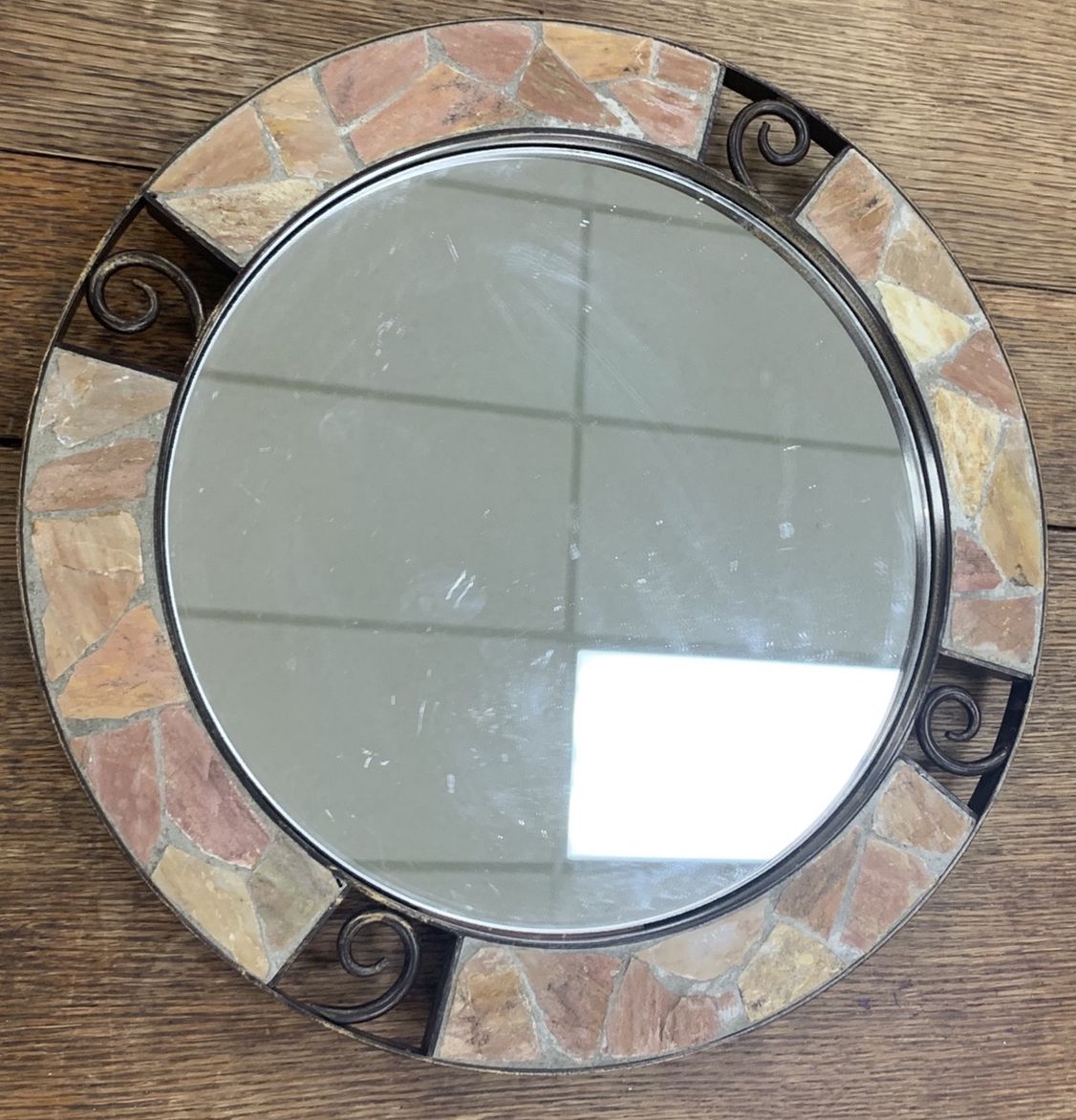 Mirror tray from Pier 1. New. Heavy. Has stone around it very pretty. You could use it in the bathroom and put your perfume bottles or anything else o