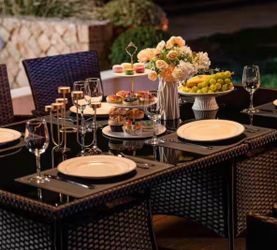 5-Piece Wicker Patio Outdoor Dining Set with Glass Tabletop, 1.5 in. Umbrella Hole and Navy Blue Cushion  New five-piece outdoor dining set includes f