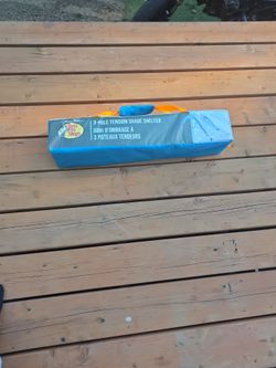 Tension shade shelter