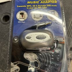 WIRELESS MUSIC ADAPTER Transmits MP3, CD & Portable DVD music to your car FM radio!