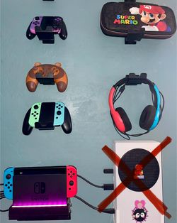 Nintendo Switch, 4 Controllers, 2 Games, 1 Headset, Mario Case, Charger And Light up Wall Mount
