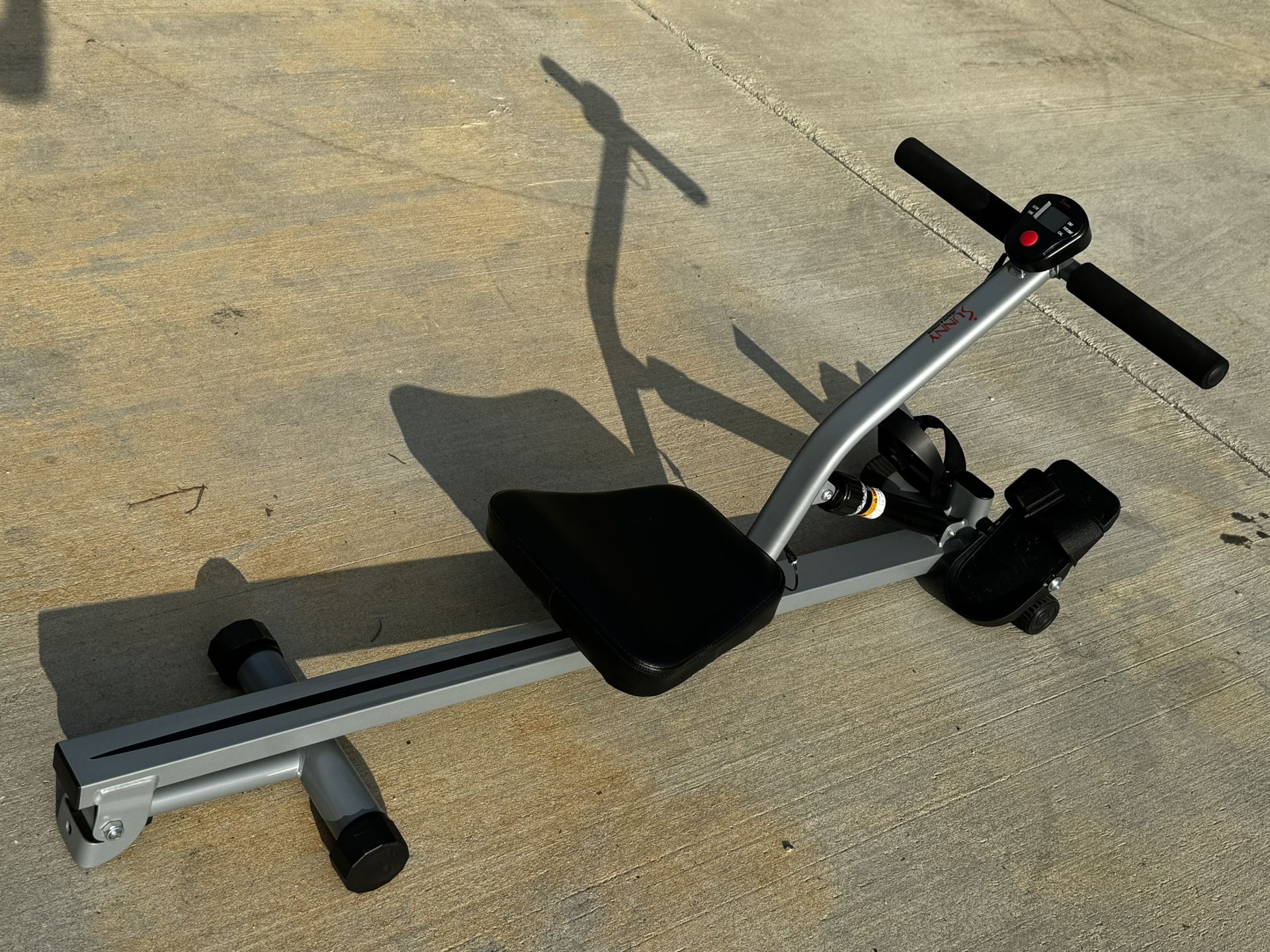 Sunny Health & Fitness Compact Adjustable Rowing Machine with 12 Levels of Complete Body Workout Resistance and Optional SunnyFit App Enhanced Connect