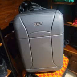 grey Delsey Paris hardside suitcase carry-on preowned never used Great conditions