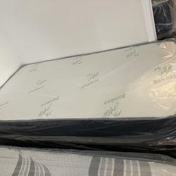 New Mattresses, Boxprings & Metal Frame, All Sizes Available New In Plastic. Twin At $99. Hablamos Espanol.
