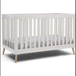 Delta Four In One Convertible Crib With Serta Mattress