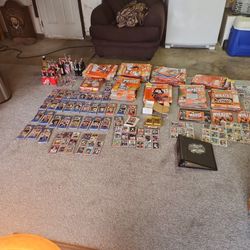 Collectable baseball cards , vintage coke , pepsi and budweiser bottles , wheaties