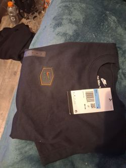 Medium nike shirt black with logo 30$$