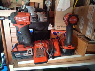 2 Milwaukee surge drills w/charger