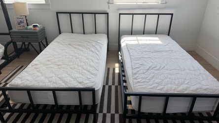 PAIR OF BLACK METAL TWIN SIZE BED FRAME AND MATTRESSES $200 for ALL!