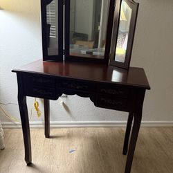 Dark Cherry Wood Vanity With Tri-Folding Mirror And Custom Carved Rose Style Pulls