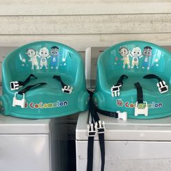 Two Children’s Plastic Booster Seats With Fastenes