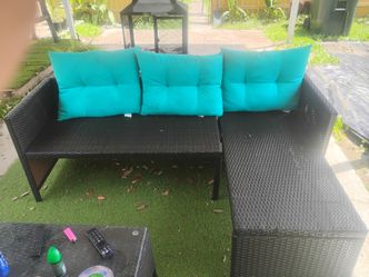 Loveseat and chase outdoor patio furniture with coffee table