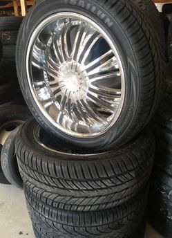 A set of four of 4 used tires and rims