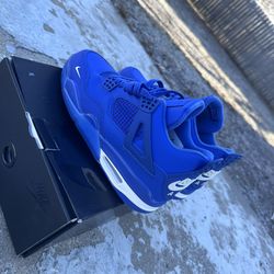 Nike Air Jordan 4s in a blue colorway