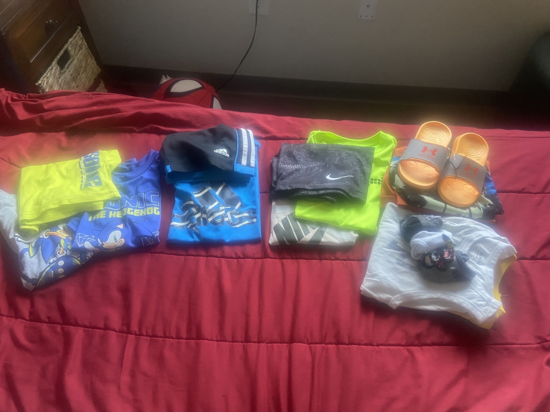 boys clothes size 6/7 some 5/6 and brand new slides size 11 